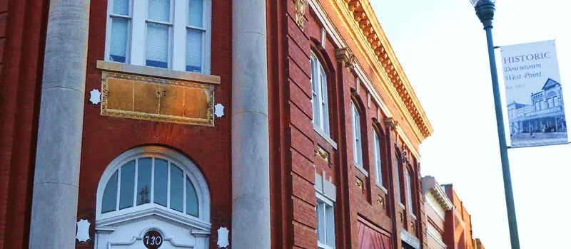 Historic brick storefronts in downtown West Point, Georgia